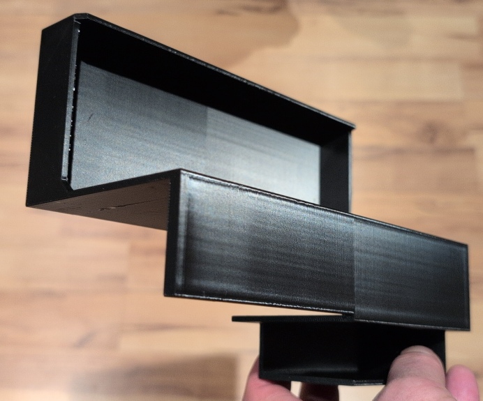3D printed clip-on mounting system with battery compartment