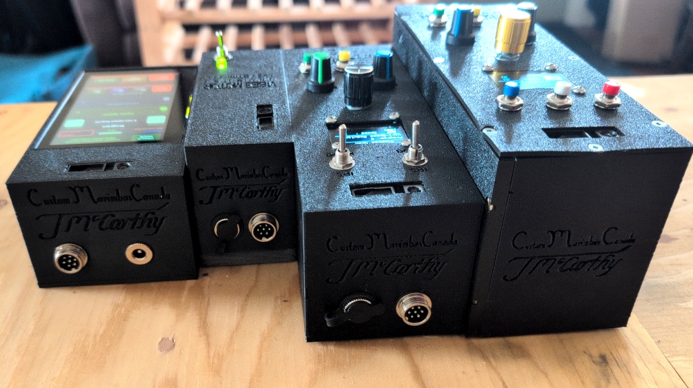 All four VMU models end view showing connector ports