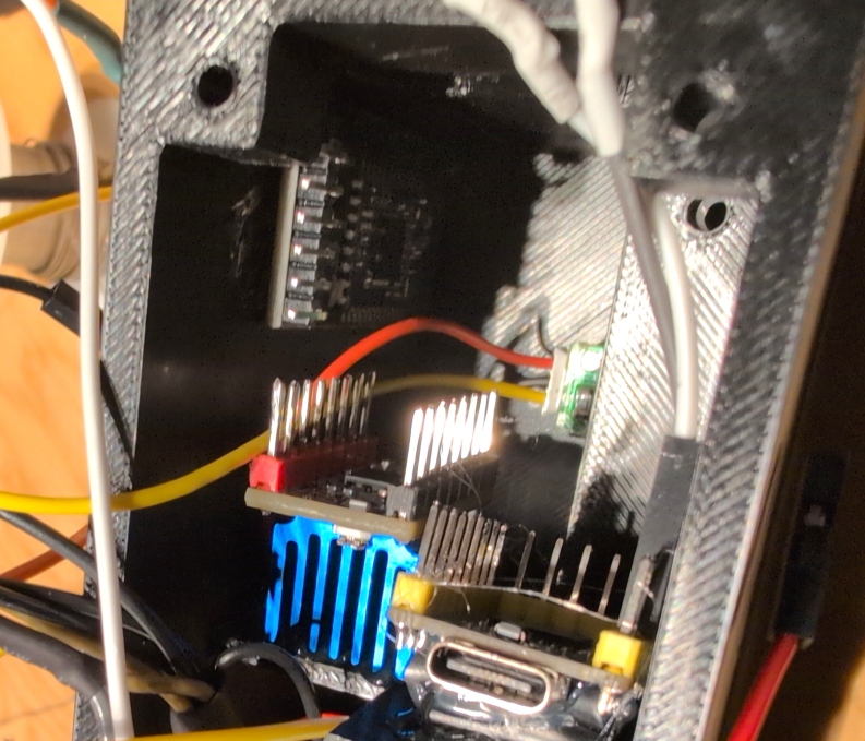 Close up inside V2 BT Micro showing PCB stack